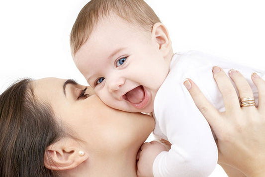 mom-baby-newborn-kiss-cuddles